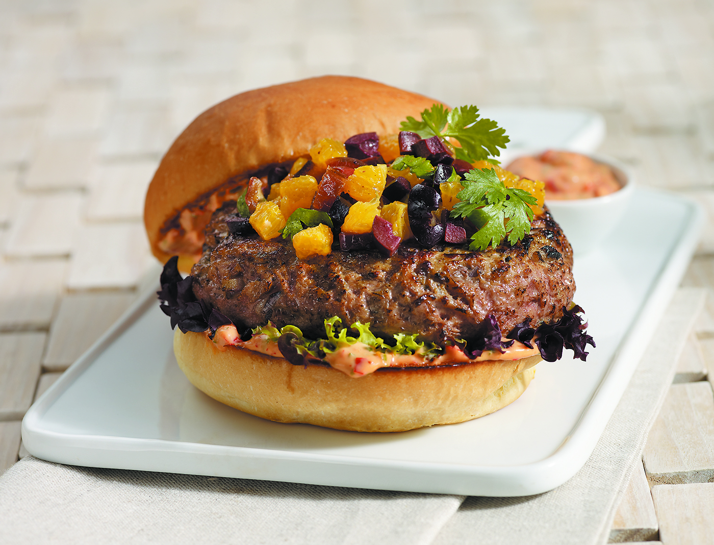 tunisian-lamb-burger-with-harissa-mayonnaise-and-orange-olive-date-relish.jpg