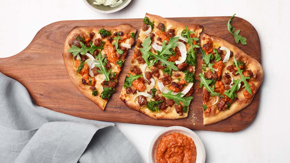 Aussie Lamb Pizza with Pickled Fennel, Hazelnut, Romesco + Gremolata